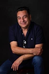 Norman Hassan profile